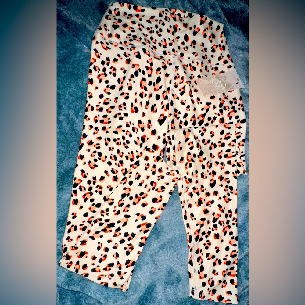 NWT Cream, Orange & Black Animal Print Woman’s Leggings